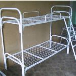 Кровати металлические - двух ярусные .